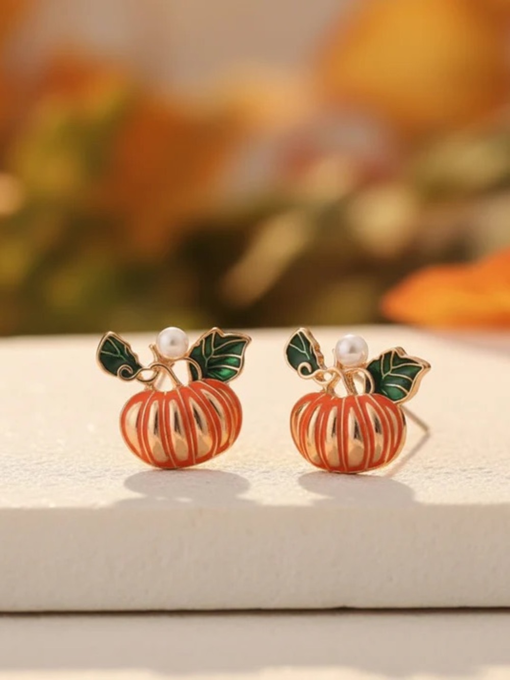 Gold-Tone Orange Pumpkin Stud Earrings with Green Leaves and Pearl Accent